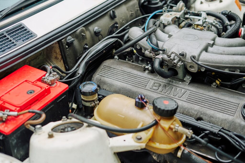 pexels-photo-30421264 Detailed view of a modified BMW engine with custom components, ideal for automotive enthusiasts.